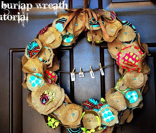 Make a simple circle burlap wreath with colorful fabric. You can add a string and hang a saying in the middle. 