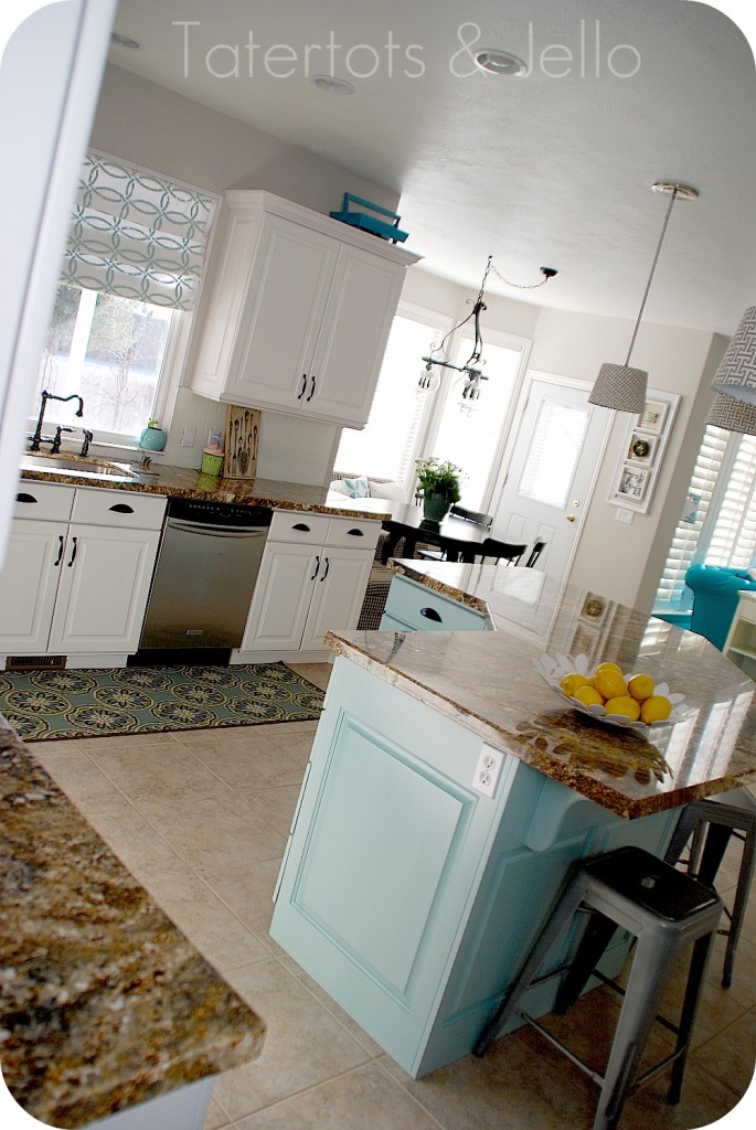 https://tatertotsandjello.com/wp-content/uploads/2012/01/aqua-and-white-kitchen-from-the-craft-room-685x1024.jpg