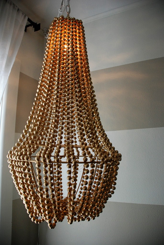 Dollar Tree DIY Wood Bead Chandelier