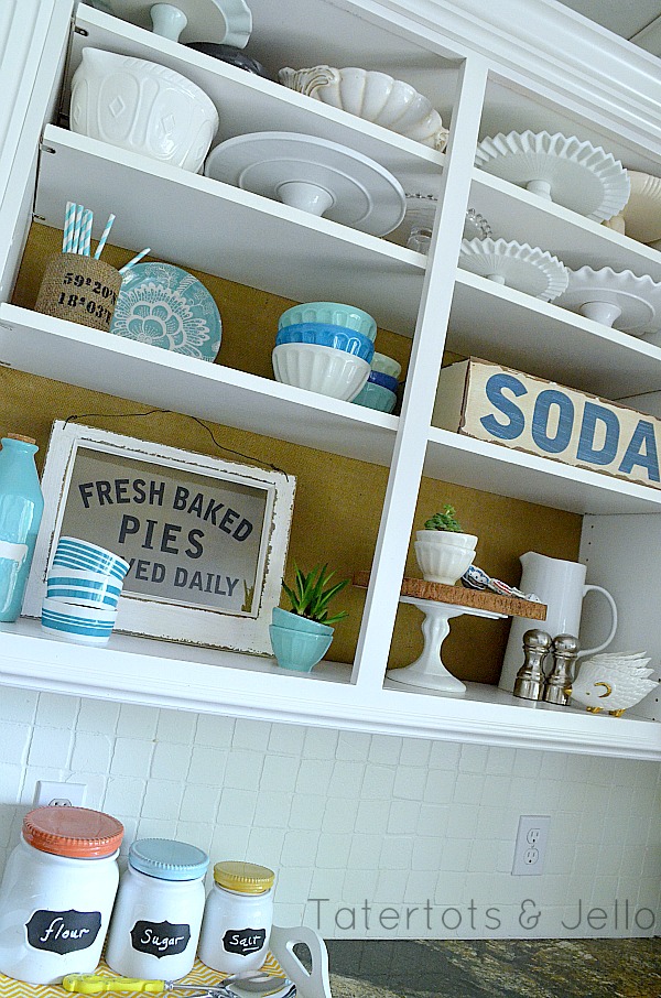 open shelves decorated for summer