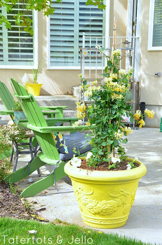 painted yellow pots at tatertotsandjello.com