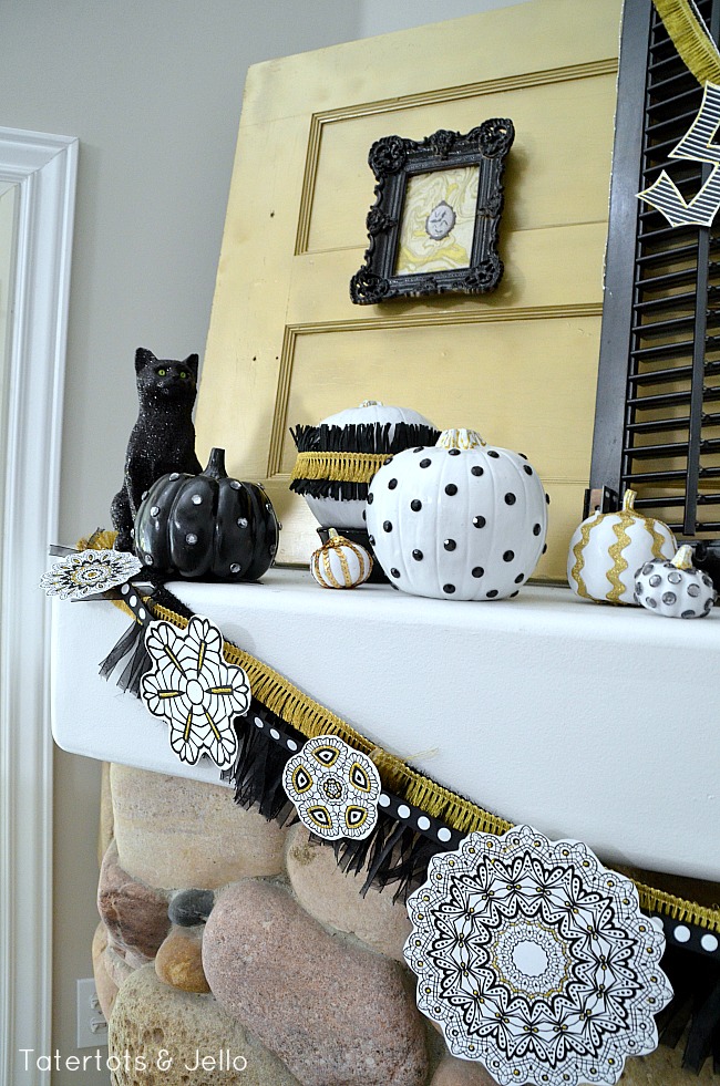 gold and black mantel at tatertotsandjello