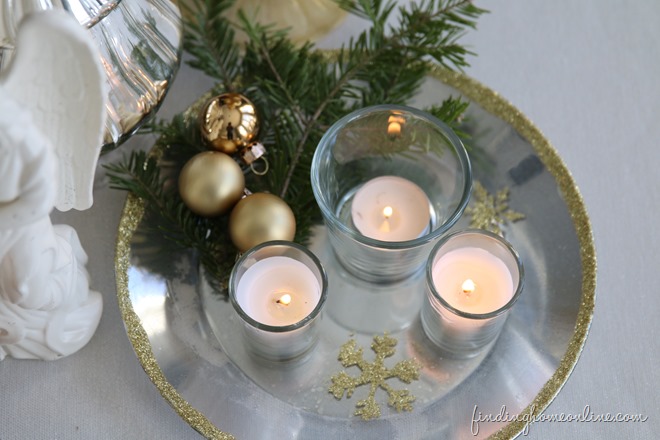 silver and gold candle plate