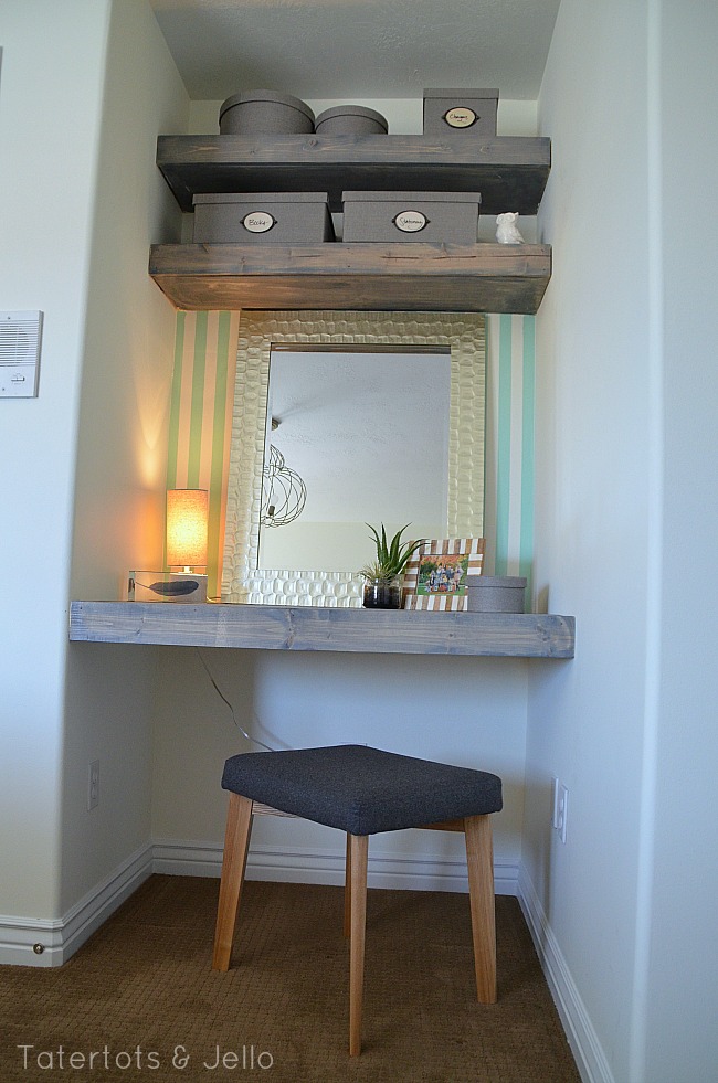 floating desk and shelves in a guest room