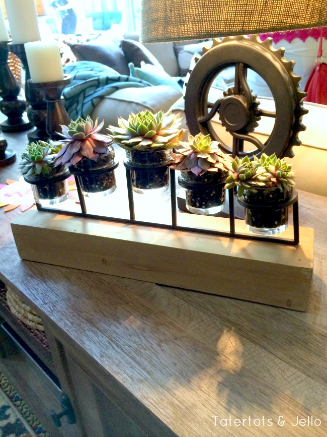 succulents in candle holder idea