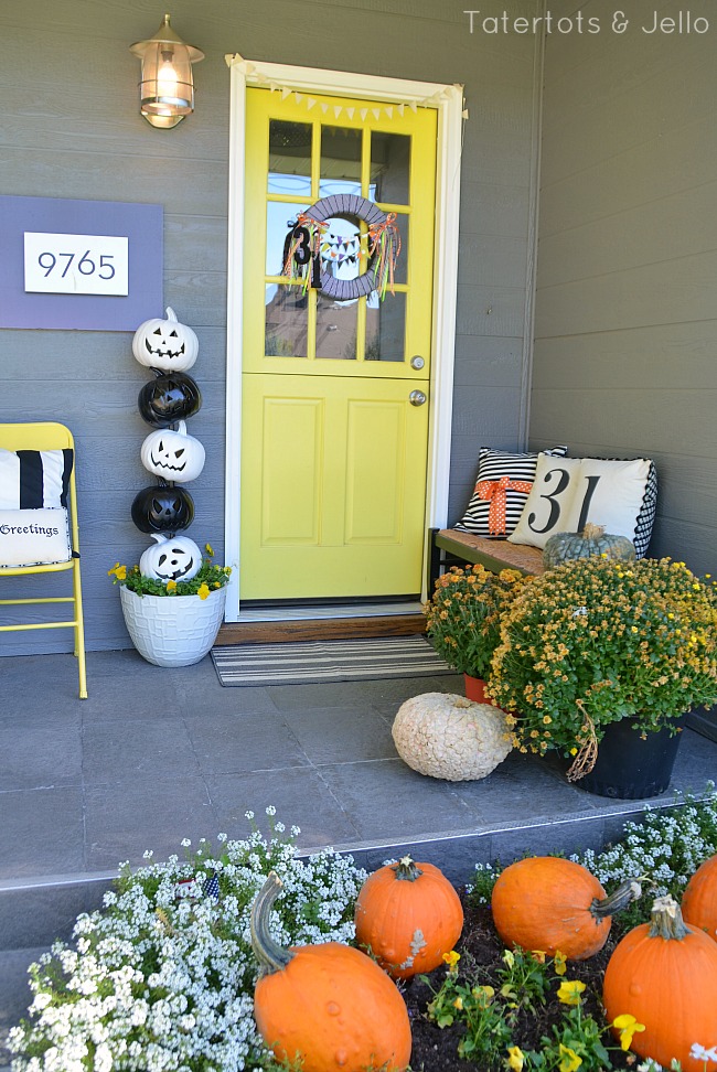 Spray paint foam jack-o-lanterns and stack them to create a Halloween Topiary. Add lights and you have a super cute and festive way to welcome guests to your home! 
