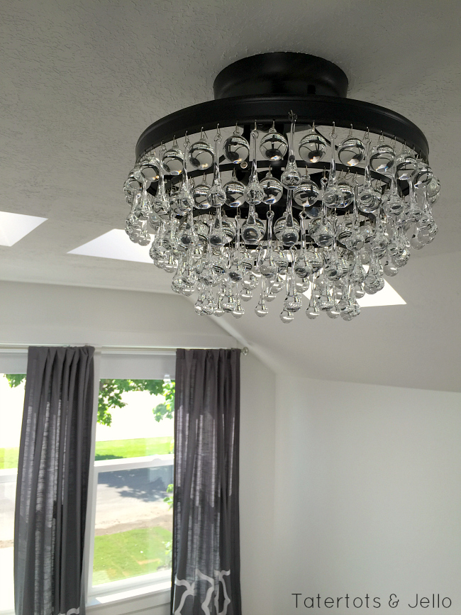 1905 cottage master bedroom chandelier