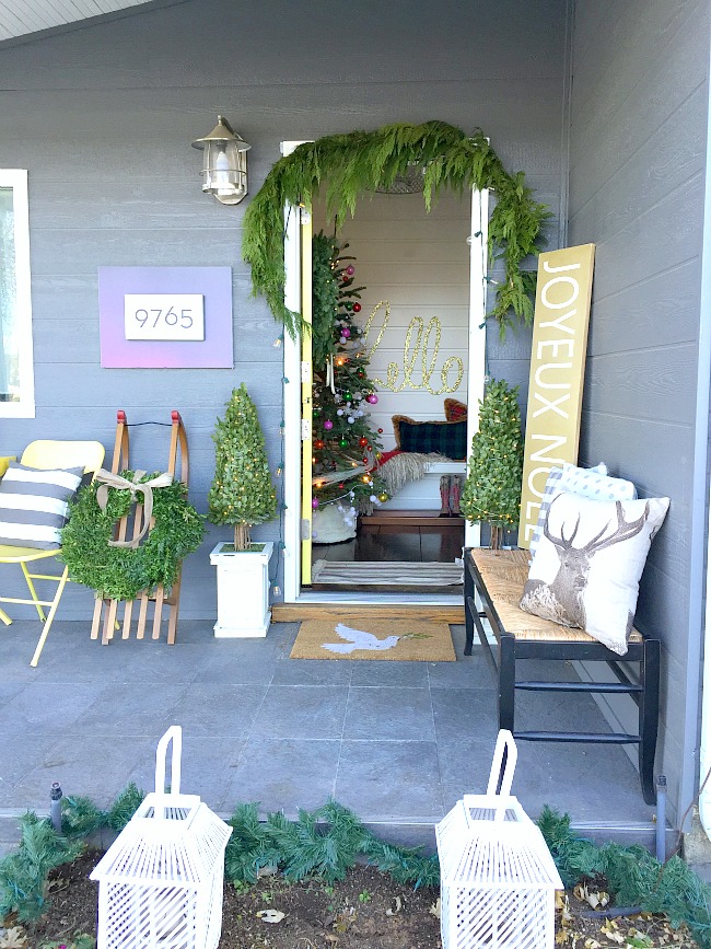 holiday green and white porch 