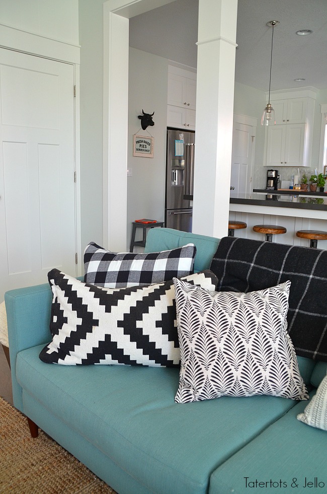 black and white pillows mixing patterns 