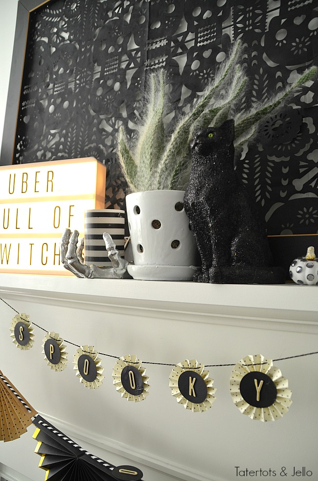 black and white neutral Halloween decorating. Halloween doesn't have to be orange and black. Celebrate this spooky season with black and white neutral decor. Project ideas! 