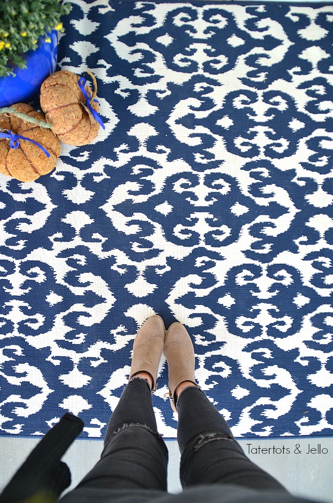 colorful rug for a fall porch