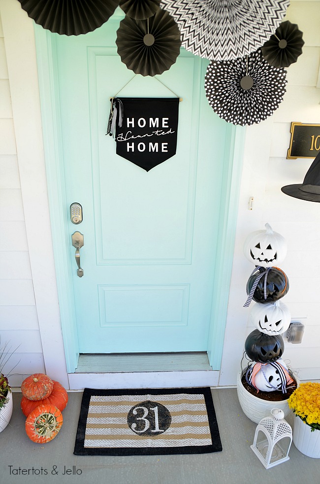 halloween porch pennant medallions. Create a witch theme for your halloween home decor this year with a DIY sign, hanging hats and other spooky ideas!