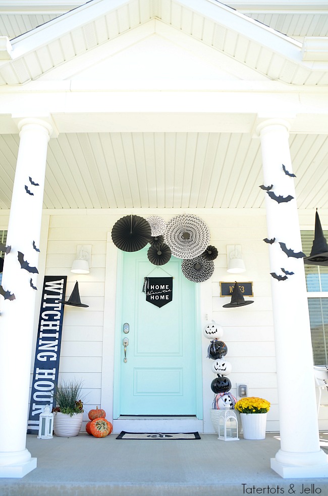 witching hour halloween porch ideas. Create a witch theme for your halloween home decor this year with a DIY sign, hanging hats and other spooky ideas!