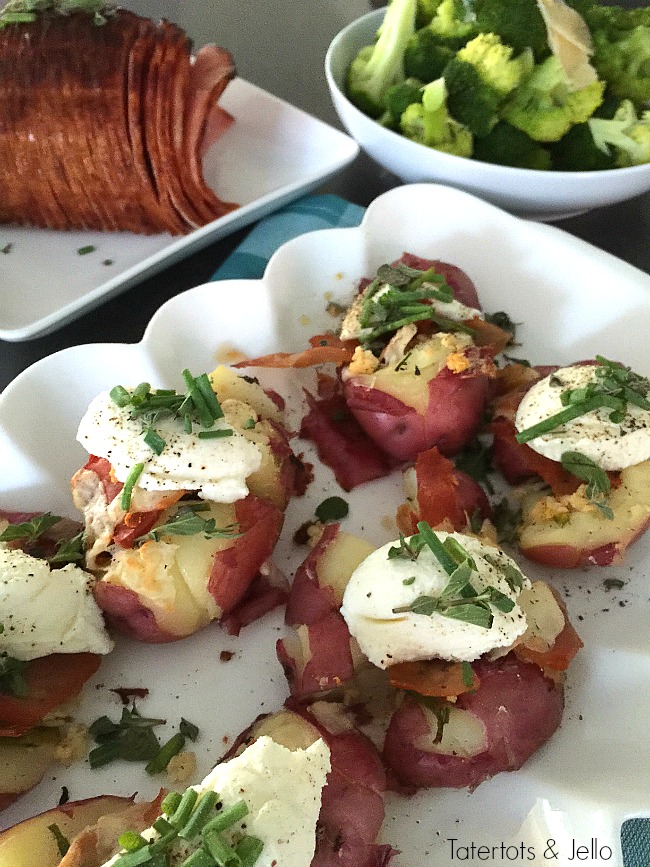 Smashed Parmesan Potatoes with Herbs, Prosciutto and Ricotta. A twist on the popular smashed potatoes, the salty addition of prosciutto and creamy ricotta cheese add delicious dimension to this beautiful side dish!