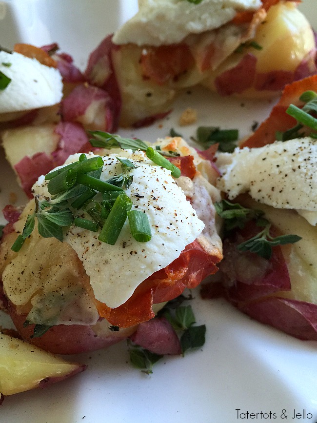 Smashed Parmesan Potatoes with Herbs, Prosciutto and Ricotta. A twist on the popular smashed potatoes, the salty addition of prosciutto and creamy ricotta cheese add delicious dimension to this beautiful side dish!