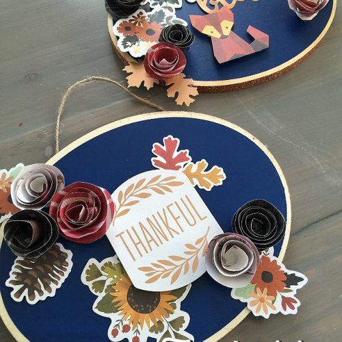 Easy Thanksgiving Door Hanging. Make a Door Hanging with an inexpensive wood slice, paper and embellishments. Find out how easy it is to make and how to make rolled paper flowers!