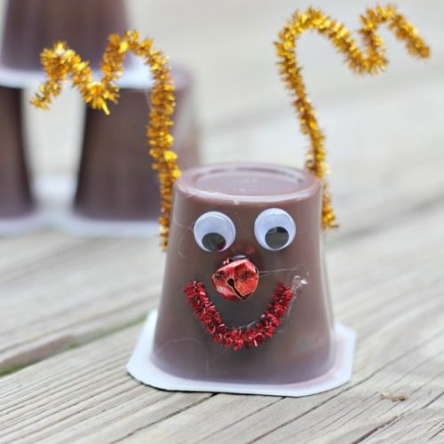 Rudolph Pudding Cups are a great snack idea. They are also the perfect craft to make at a holiday school or kid party. And delicious too!