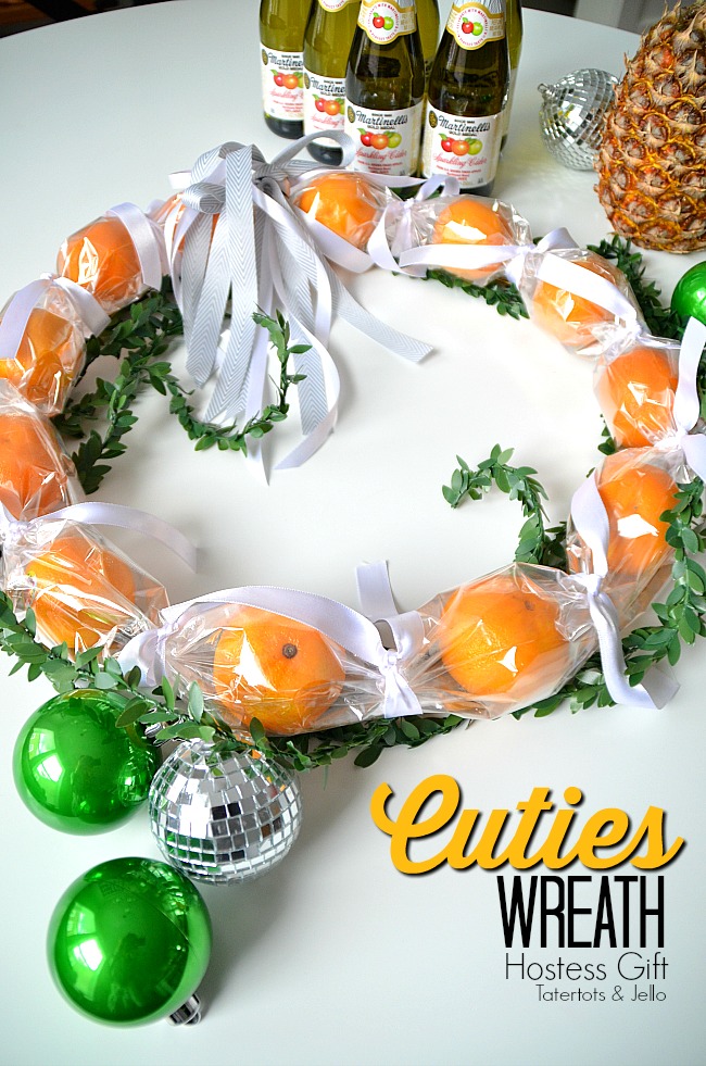 Holiday Gift Idea Edible Wreath. Make a fresh and beautiful wreath for your neighbors or as a hostess gift idea. Fresh cutie oranges are beautiful and great to eat.