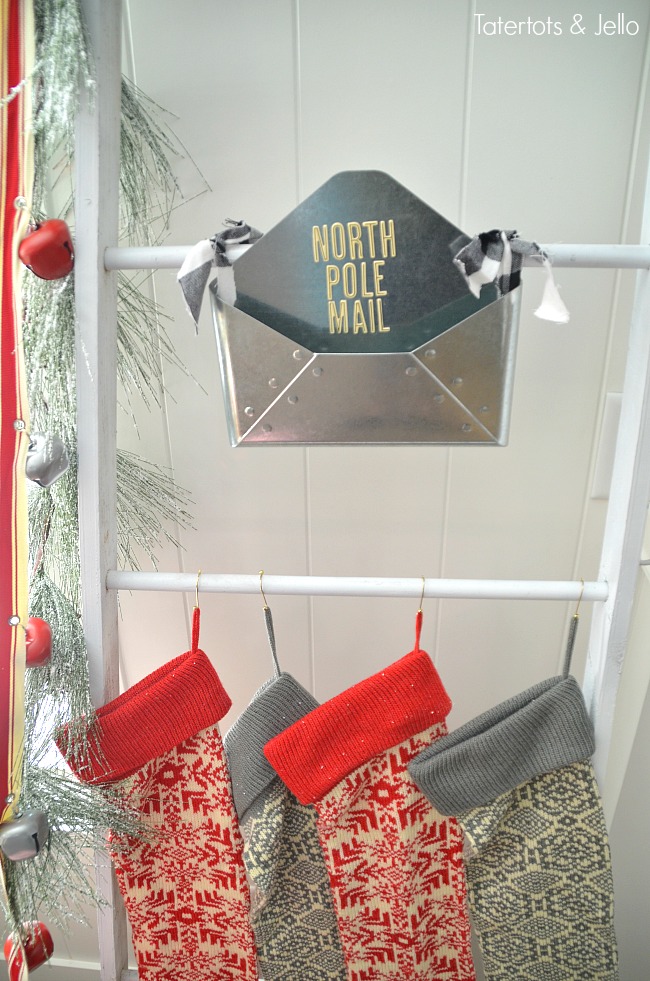 Santa North Pole Christmas Tree decorating ideas. Make a simple red and white Santa christmas tree. Find all the details and DIY ideas at Tatertots and Jello! 