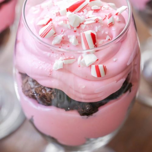 Peppermint Brownie Trifle - a delicious holiday dessert with layers of brownie pieces, peppermint cream and all topped with crushed candy canes!