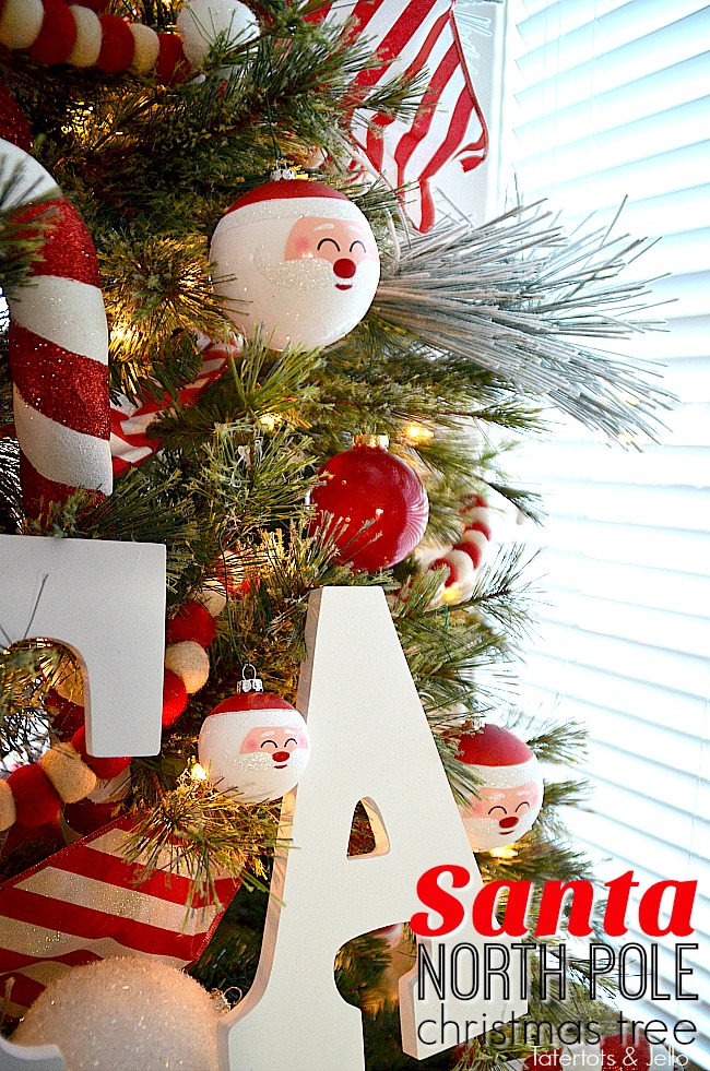 Santa North Pole Christmas Tree decorating ideas. Make a simple red and white Santa christmas tree. Find all the details and DIY ideas at Tatertots and Jello! 