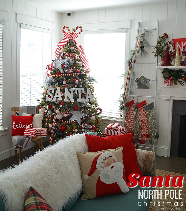 Santa North Pole Christmas Tree decorating ideas. Make a simple red and white Santa christmas tree. Find all the details and DIY ideas at Tatertots and Jello!