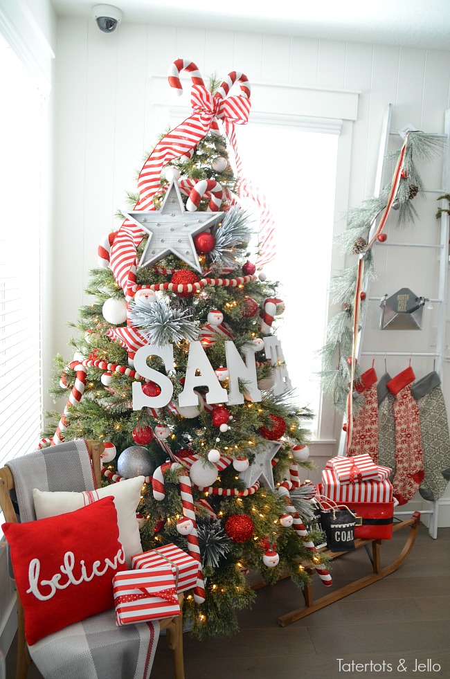 Santa North Pole Christmas Tree decorating ideas. Make a simple red and white Santa christmas tree. Find all the details and DIY ideas at Tatertots and Jello! 