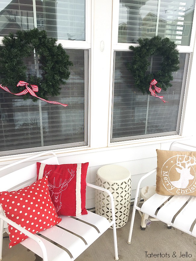 Red and White North Pole Christmas Porch. Many different inexpensive ways to celebrate the season and decorate YOUR outdoor space!