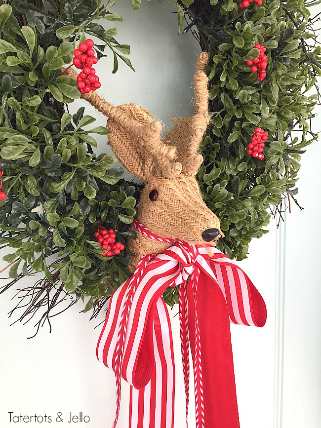 Red and White North Pole Christmas Porch. Many different inexpensive ways to celebrate the season and decorate YOUR outdoor space!