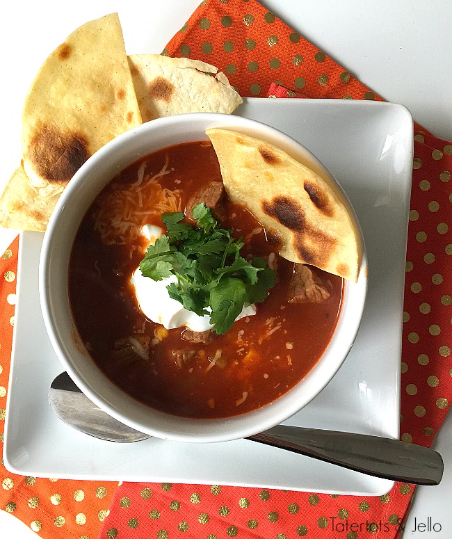 Use your pressure cooker/instant pot to make a this fast and satisfying Tex Mex Soup that is packed with protein and vegetables. It's the perfect soup to make on a cold Winter's night! 