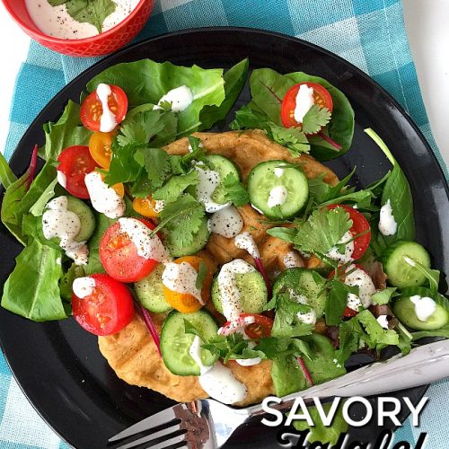 Savory Falafel Waffles are a savory dinner idea. Warm and savory waffles that taste like falafels are surrounded by a cool salad and tangy yogurt dressing.