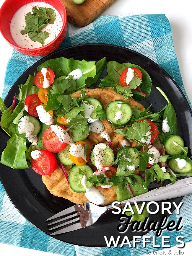 Savory Falafel Waffles are a savory dinner idea. Warm and savory waffles that taste like falafels are surrounded by a cool salad and tangy yogurt dressing.