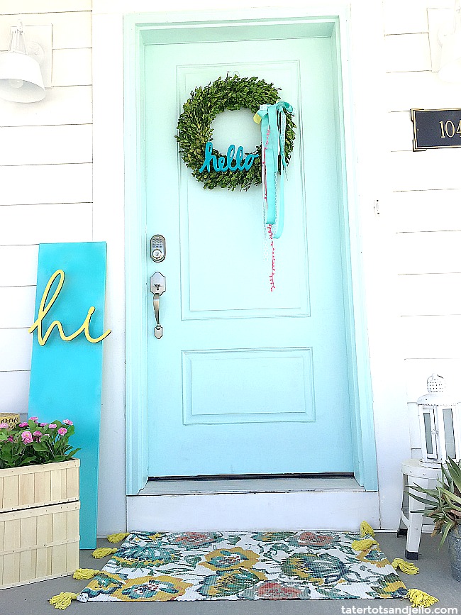Colorful Happy Home Porch. Easy ways tp decorate your home for Spring.