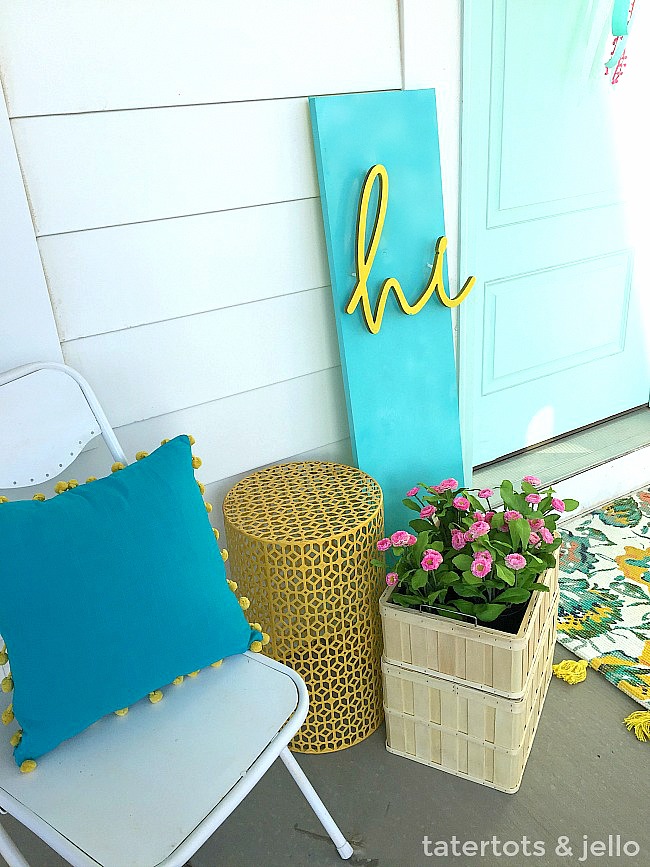 DIY 3-Dimensional Spring Sign. Make a bright and happy spring sign for your porch.