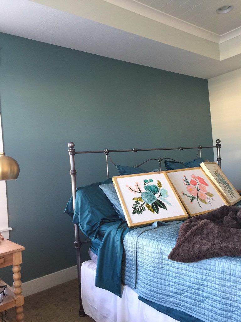Painting a focal wall can take the stress out of adding a bright or dark paint color to a room.