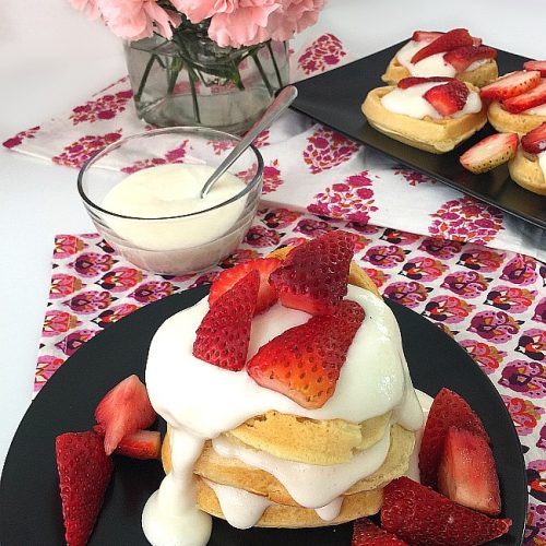 Strawberry Shortcake Cream Cheese Waffles. Make these for brunch or as a dessert. Your family will love the fluffy waffles covered with a light sweet cream cheese topping and strawberries!