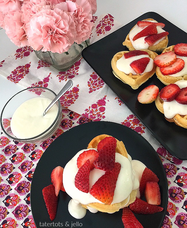 Strawberry Shortcake Cream Cheese Waffles. Make these for brunch or as a dessert. Your family will love the fluffy waffles covered with a light sweet cream cheese topping and strawberries! 