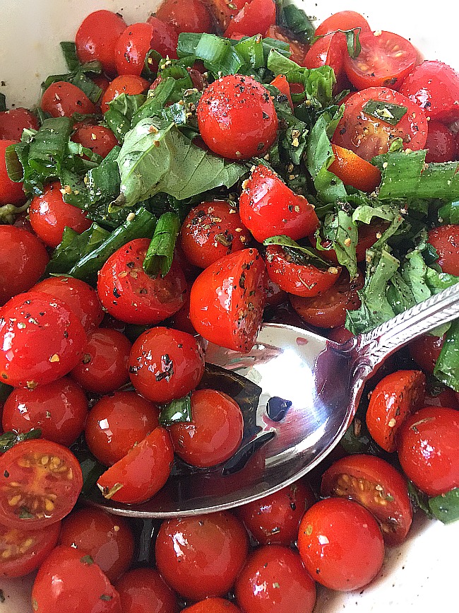 Easy Marinated Tomato Salad. The perfect easy salad to take to a summer BBQ or party, it tastes even better a couple of days later! 