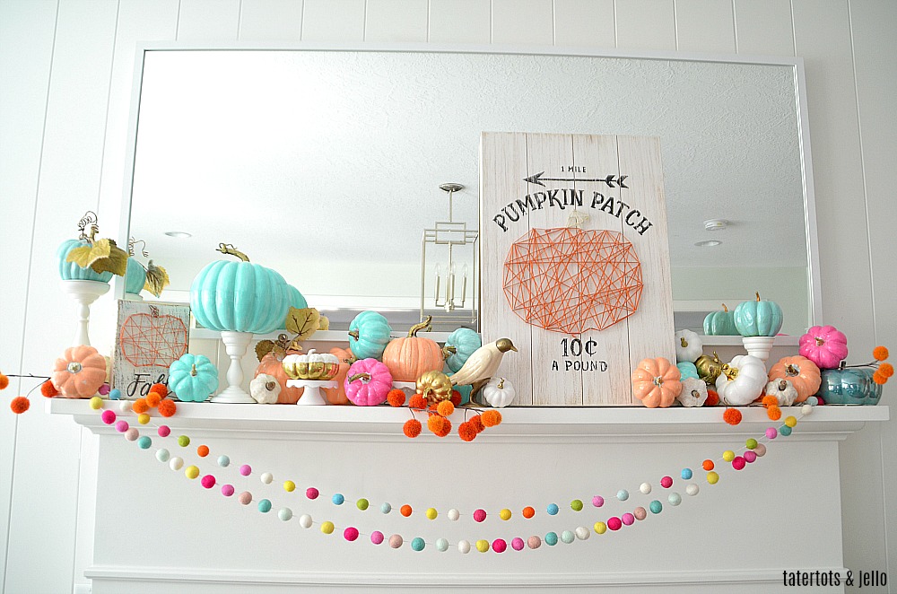 Colorful Fall Mantel with Painted Foam Pumpkins. Paint inexpensive pumpkins bright colors for a unexpected colorful fall mantel!