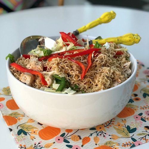 Chinese Chicken Salad is a family secret. Full of crisp cabbage, veggies, filling chicken breasts and topped with ramen noodles. Kids AND parents love it!