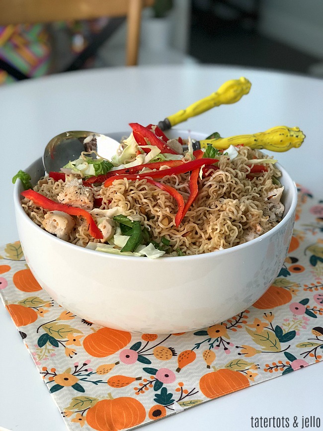 Chinese Chicken Salad is a family secret. Full of crisp cabbage, veggies, filling chicken breasts and topped with ramen noodles. Kids AND parents love it!