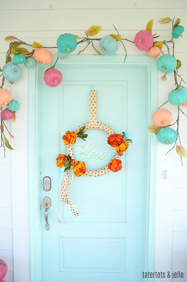 Beautiful DIY Thanksgiving wreaths adorned with autumn leaves, pumpkins, and berries.