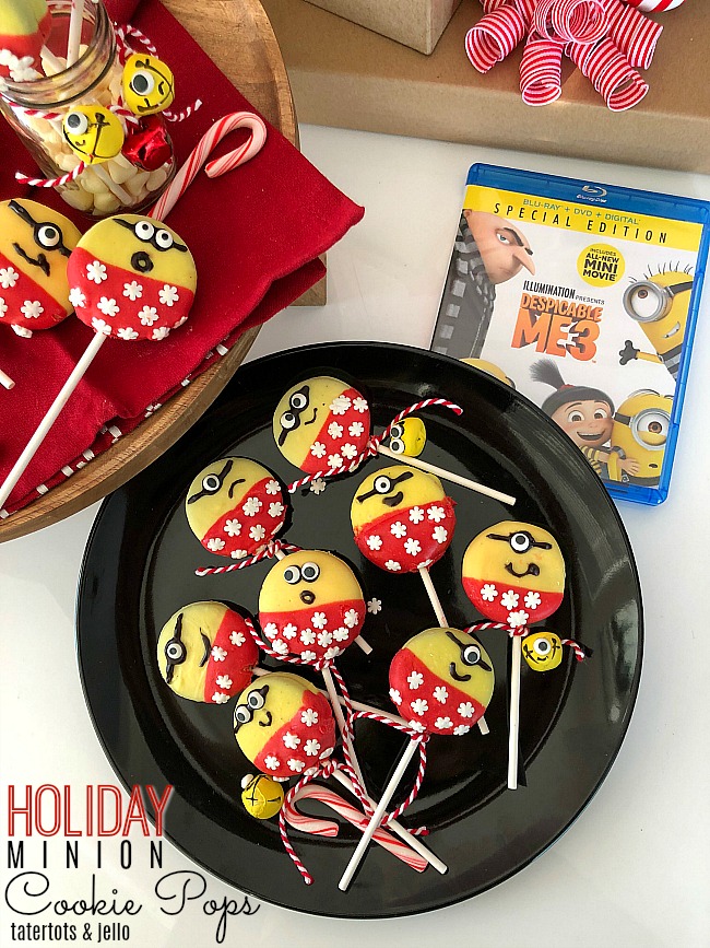 Holiday Minion Cookie Pops - celebrate the Despicable 3 movie with a family movie night and make these adorable Minion holiday cookie pops!