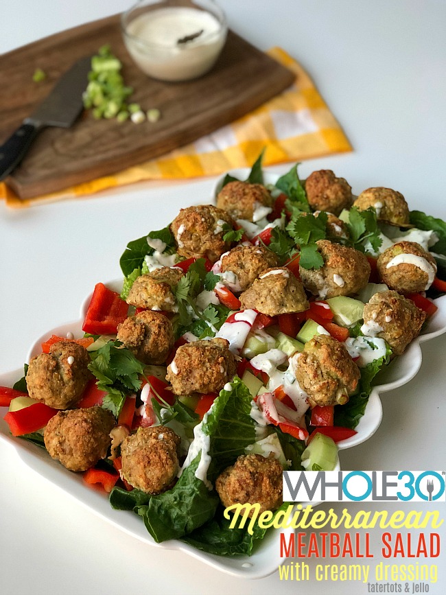 Whole 30 Mediterranean Meatball Salad with Creamy Dressing. Juicy Meatballs with crispy greens and a creamy dressing are delicious and Whole 30 compliant too!