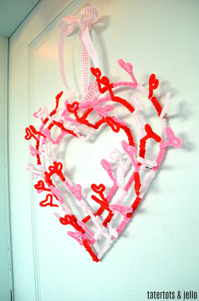 Valentine's Day Heart Pipe Cleaner Wreath. Make this whimsical wreath with items at your dollar store!