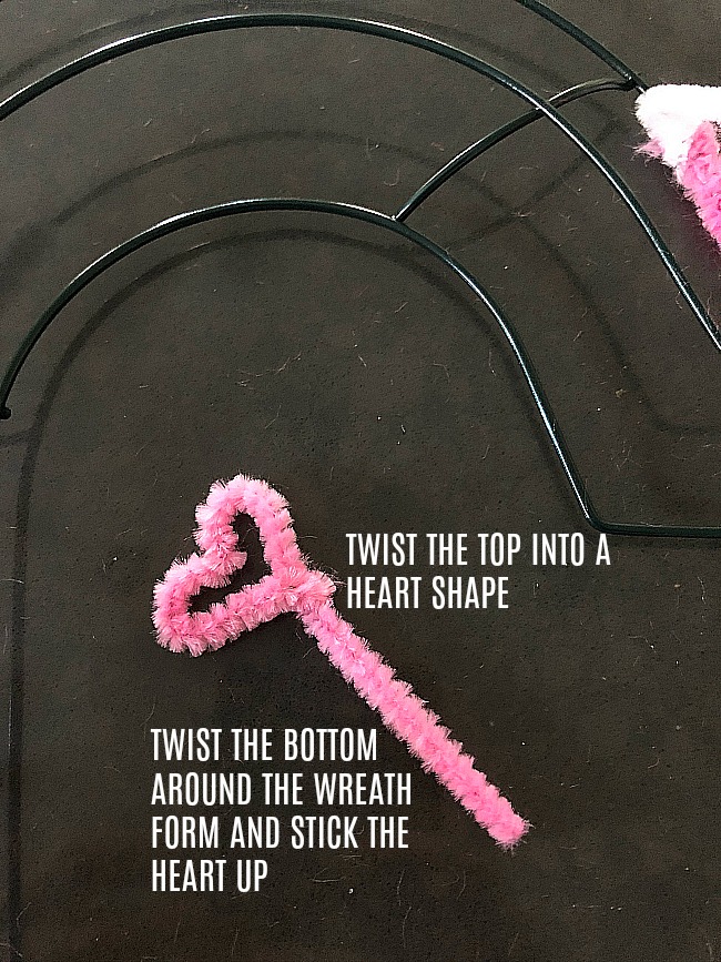 Valentine's Day Heart Pipe Cleaner Wreath. Make this whimsical wreath with items at your dollar store!