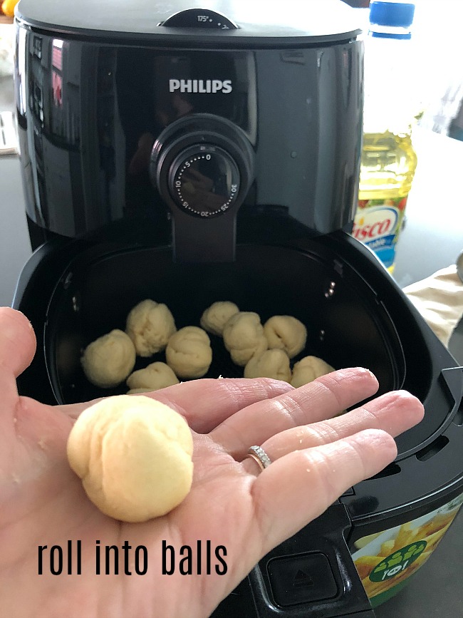 3 Minute Airfry Cinnamon Sugar Donut Holes are so easy to make! You use pre-packaged biscuit dough and they are ready in 3 minutes and much healthier than deep frying! 