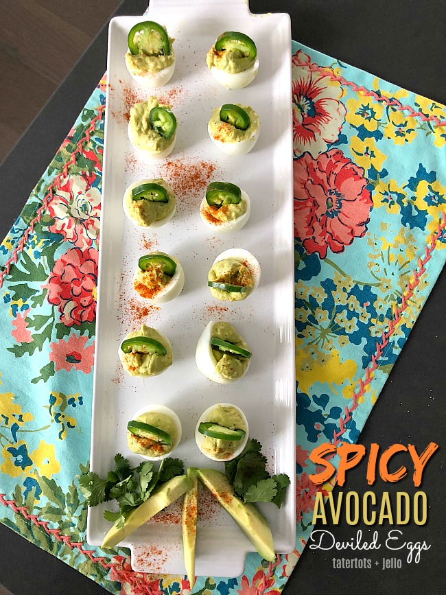 Spicy Avocado Deviled Eggs are a zesty twist on traditional deviled eggs. Filled with creamy avocado and egg yolks, plus spiced and topped with sliced jalapenos, these eggs will be the star of your spring brunch! 