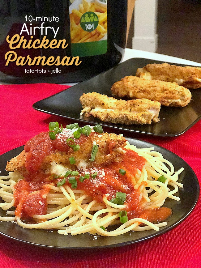 10-minute Chicken Parmesan using the Airfry machine. Much healthier than traditionally fried chicken parmesan. Crispy on the outside, moist on the inside with gooey cheese and a topping of tomato sauce. Yum! 