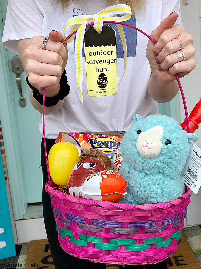Celebrate Easter with an Outdoor Easter Scavenger Hunt with printable clues! Your kids and teens will love running around the neighborhood solving clues and collecting a basket of super cute treats. 